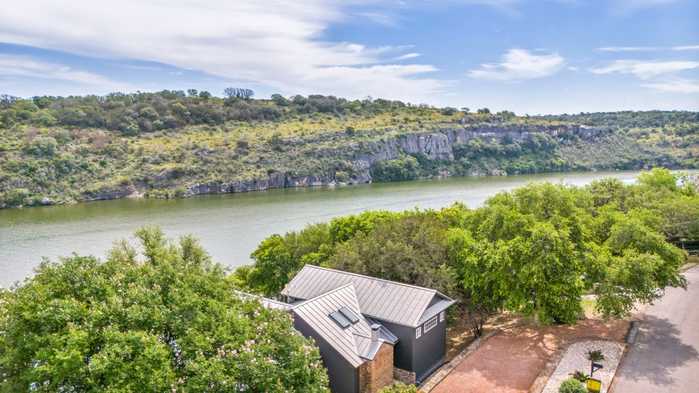 photo 1: 702 Los Escondidos Street, Marble Falls TX 78654