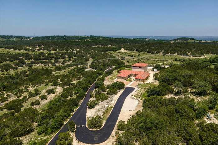 photo 1: 1708 Windy Walk Cove, Spicewood TX 78669