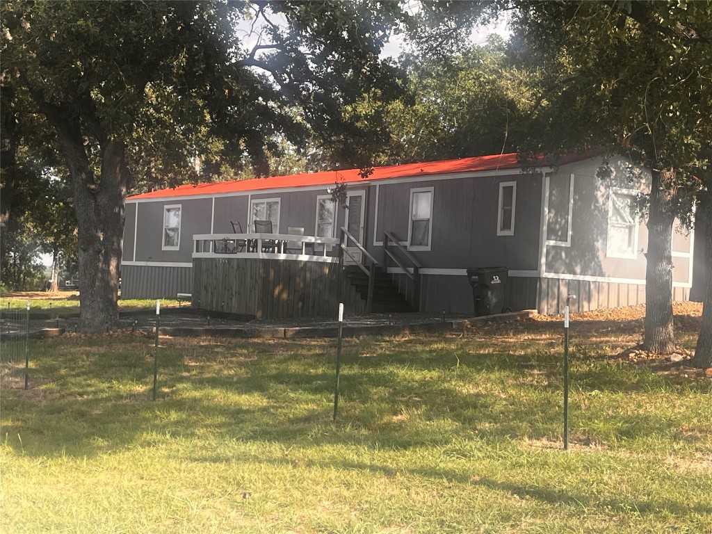 photo 2: 344 Derrick Road, Luling TX 78648