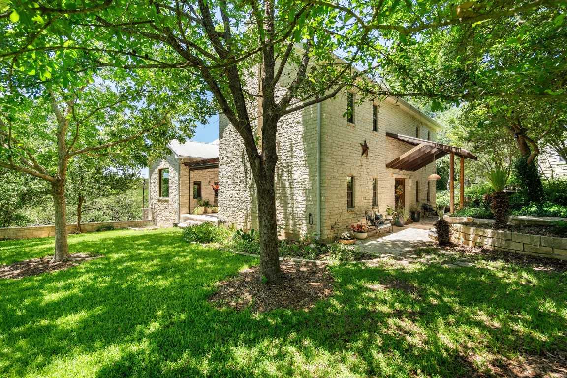 photo 1: 1300 Crystal Creek Drive, Austin TX 78746