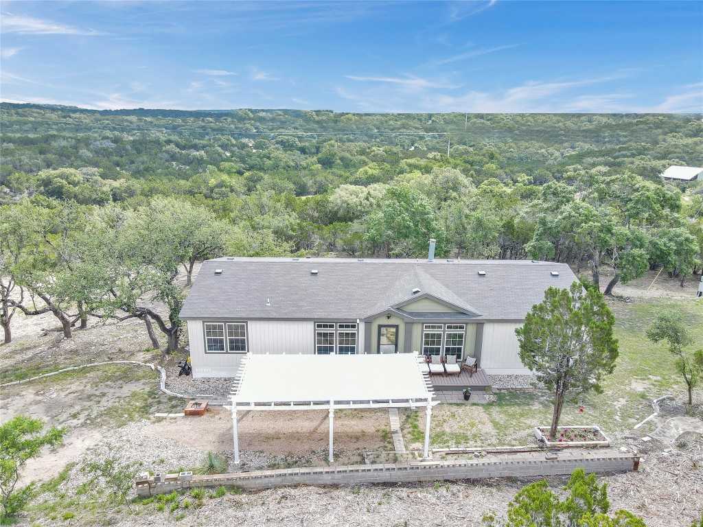 photo 1: 7500 Muleshoe Bend Trail, Marble Falls TX 78654