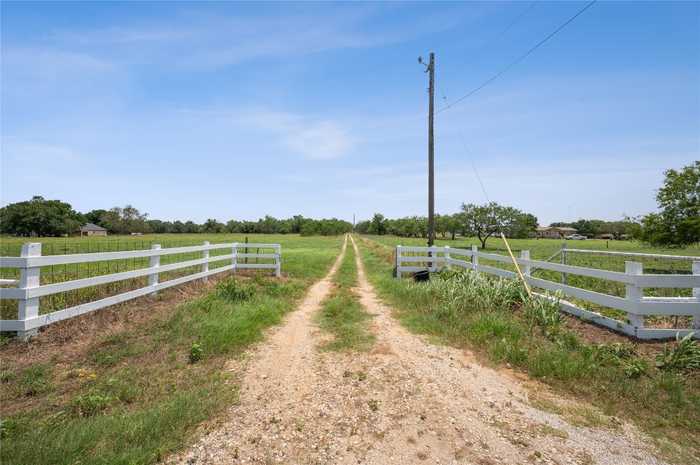 photo 1: 1922 Harwood Road, Luling TX 78648