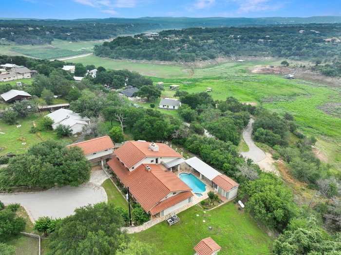 photo 1: 25242 Paleface Lake Drive, Spicewood TX 78669