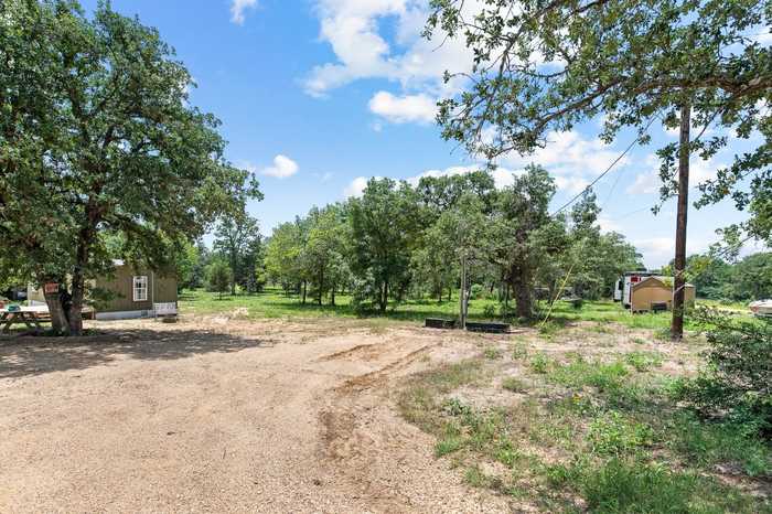 photo 1: 11790 Silver Springs Road, Rockdale TX 76567