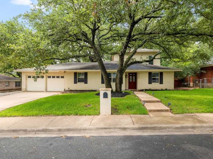 photo 1: 8715 Tallwood Drive, Austin TX 78759