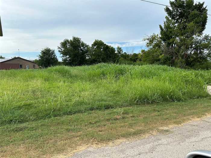 photo 1: 213 4th Street, Rockdale TX 76567