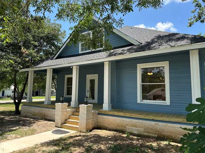 photo 1: 561 S Chambers Street, Giddings TX 78942