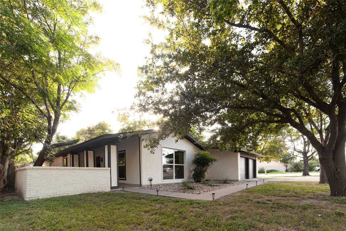 photo 1: 1415 Mearns Meadow Boulevard, Austin TX 78758