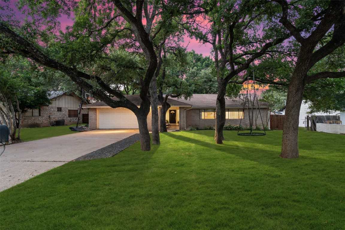 photo 1: 4406 Balcones Woods Drive, Austin TX 78759