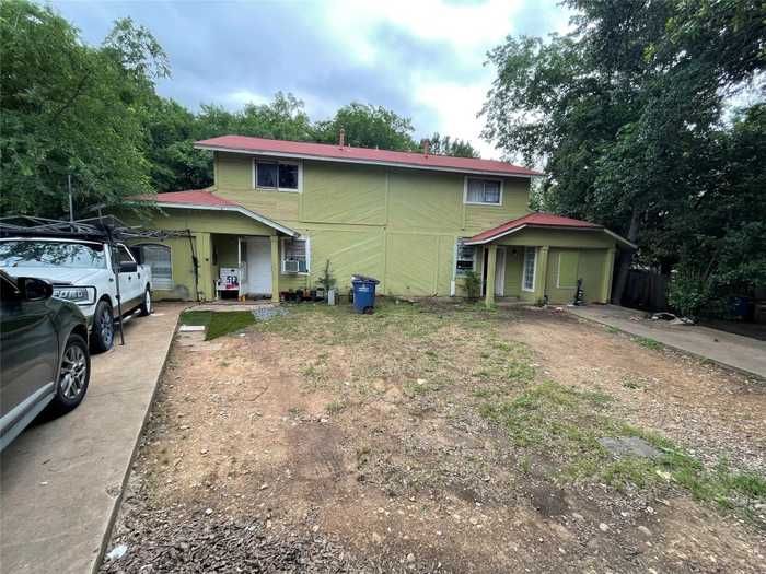 photo 1: 5201 Woodland Oaks Court, Austin TX 78744