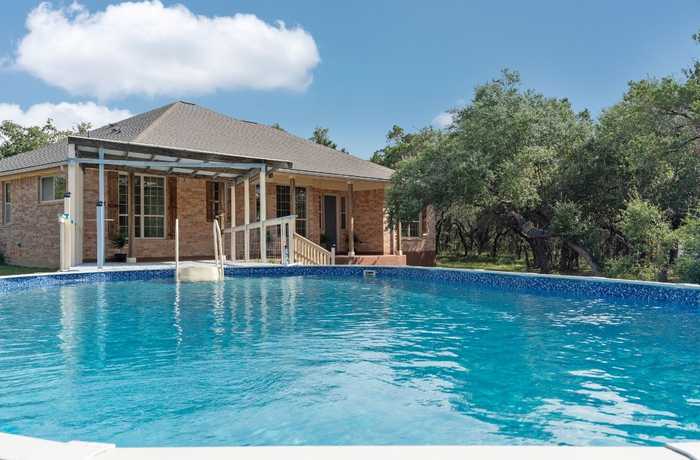 photo 1: 300 Round Rock Road, Wimberley TX 78676