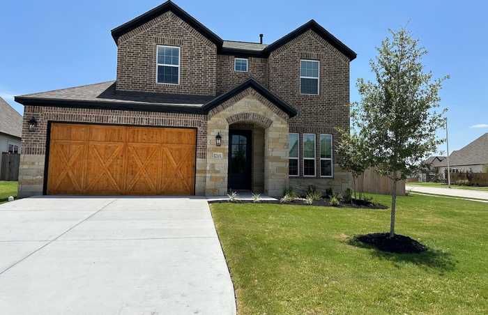 photo 1: 17301 Howdy Way, Manor TX 78653