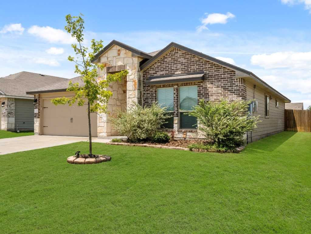 photo 1: 203 Reagor Drive, Taylor TX 76574