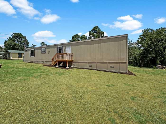 photo 1: 110 Kiowa Drive, Smithville TX 78957