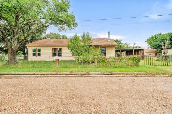 photo 1: 148 E Boundary Street, Giddings TX 78942