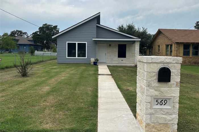 photo 1: 569 N Chambers Street, Giddings TX 78942