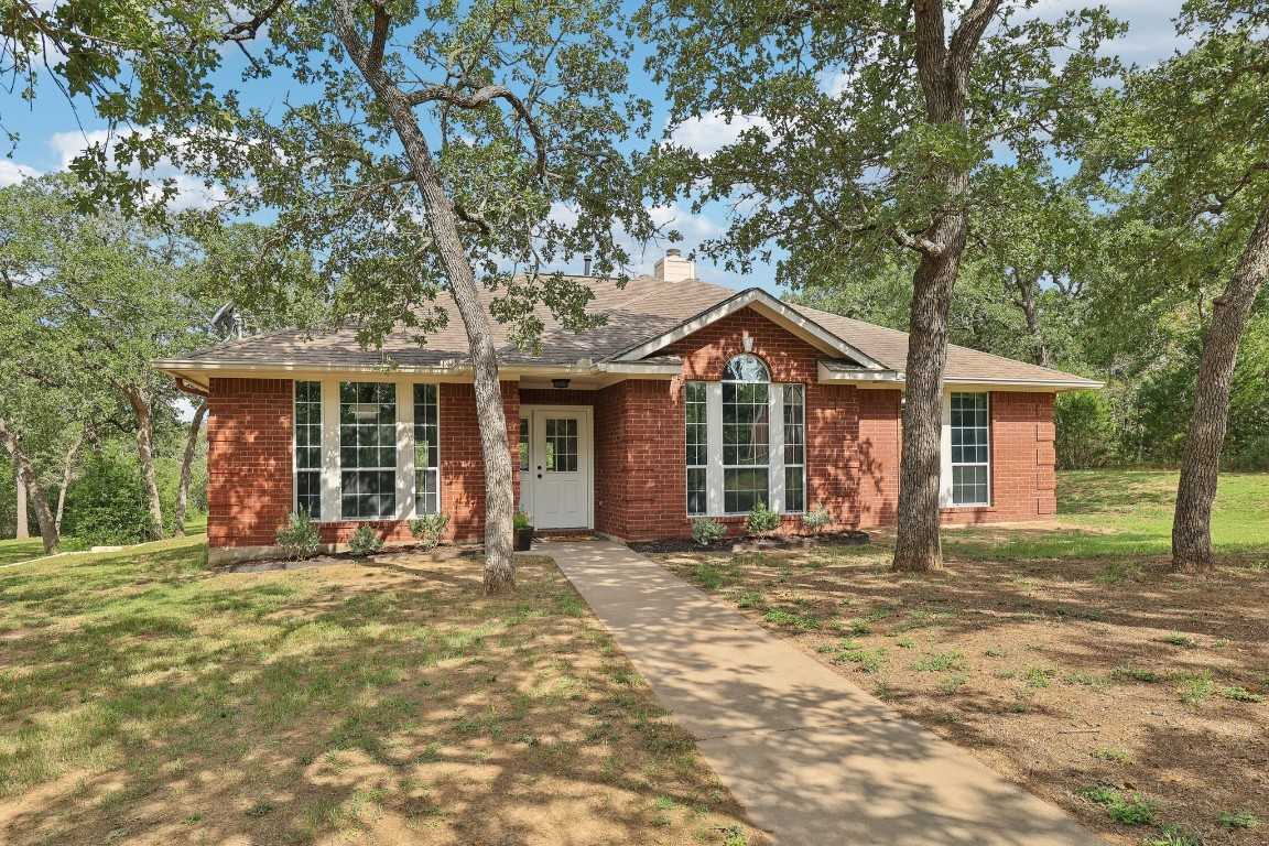 photo 1: 323 Shady Oaks Loop, Cedar Creek TX 78612