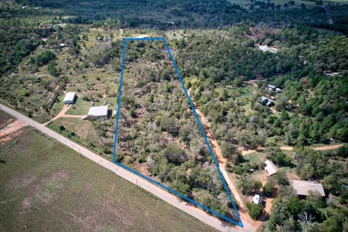 photo 1: 123 ABBEY Lane, Smithville TX 78957