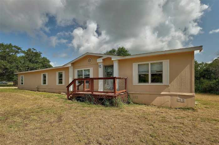 photo 1: 255 Blue Flame Road, Cedar Creek TX 78612