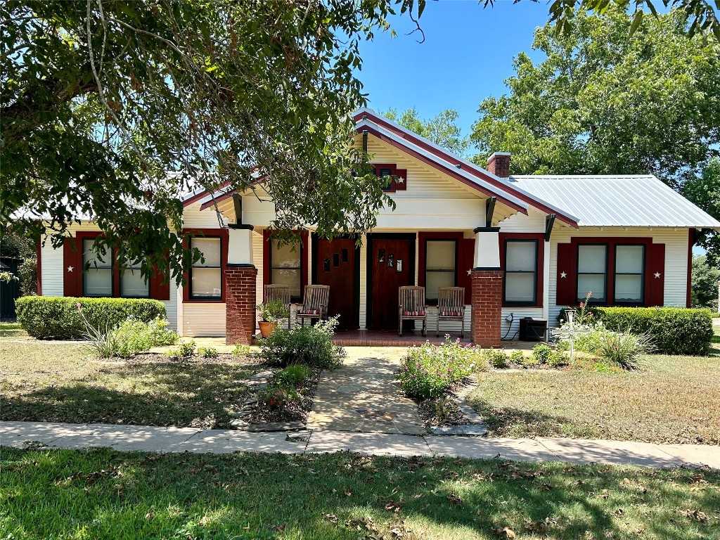 photo 1: 306 S Market Street, Flatonia TX 78941