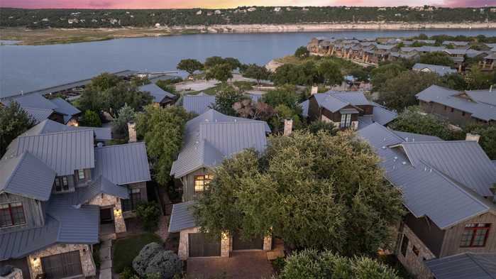 photo 1: 2105 Keeneland Cove Unit 6, Spicewood TX 78669