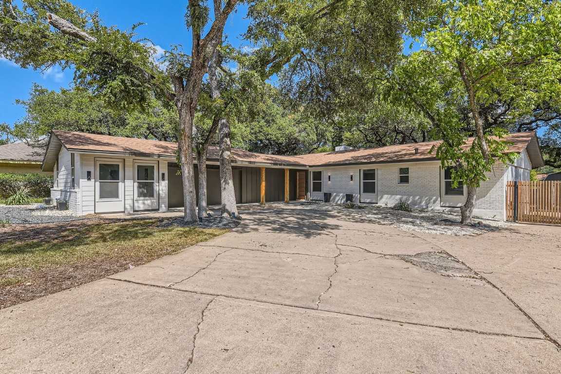 photo 1: 8707 Honeysuckle Trail, Austin TX 78759