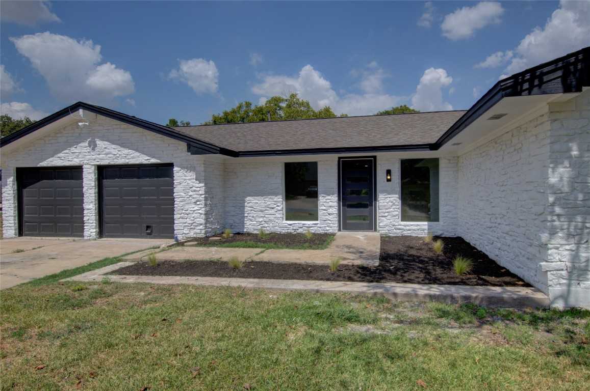 photo 1: 1402 Cardinal Hill Drive, Austin TX 78758