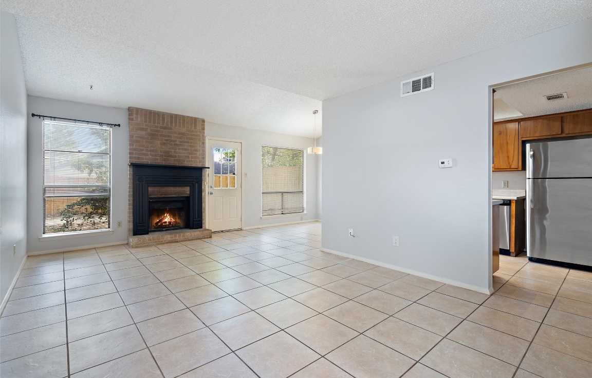 photo 1: 11435 Ptarmigan Drive, Austin TX 78758