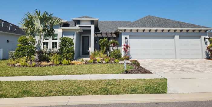 photo 1: 4150 Negal Circle, Melbourne FL 32901