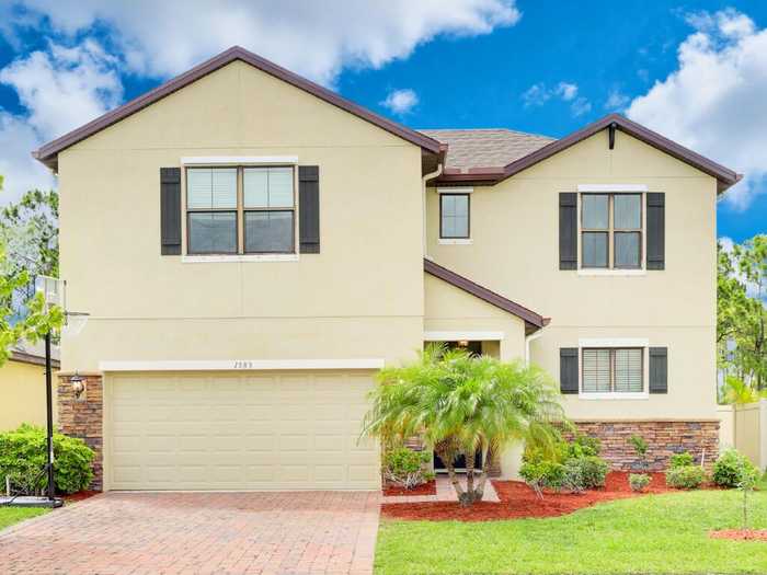 photo 1: 1583 Musgrass Circle, West Melbourne FL 32904