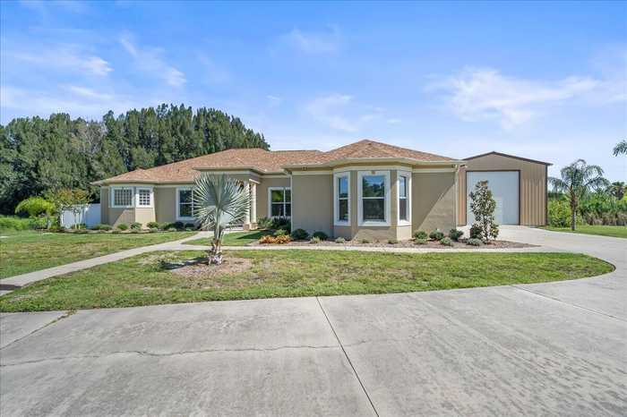 photo 1: 6498 Nunzio Lane, Merritt Island FL 32953