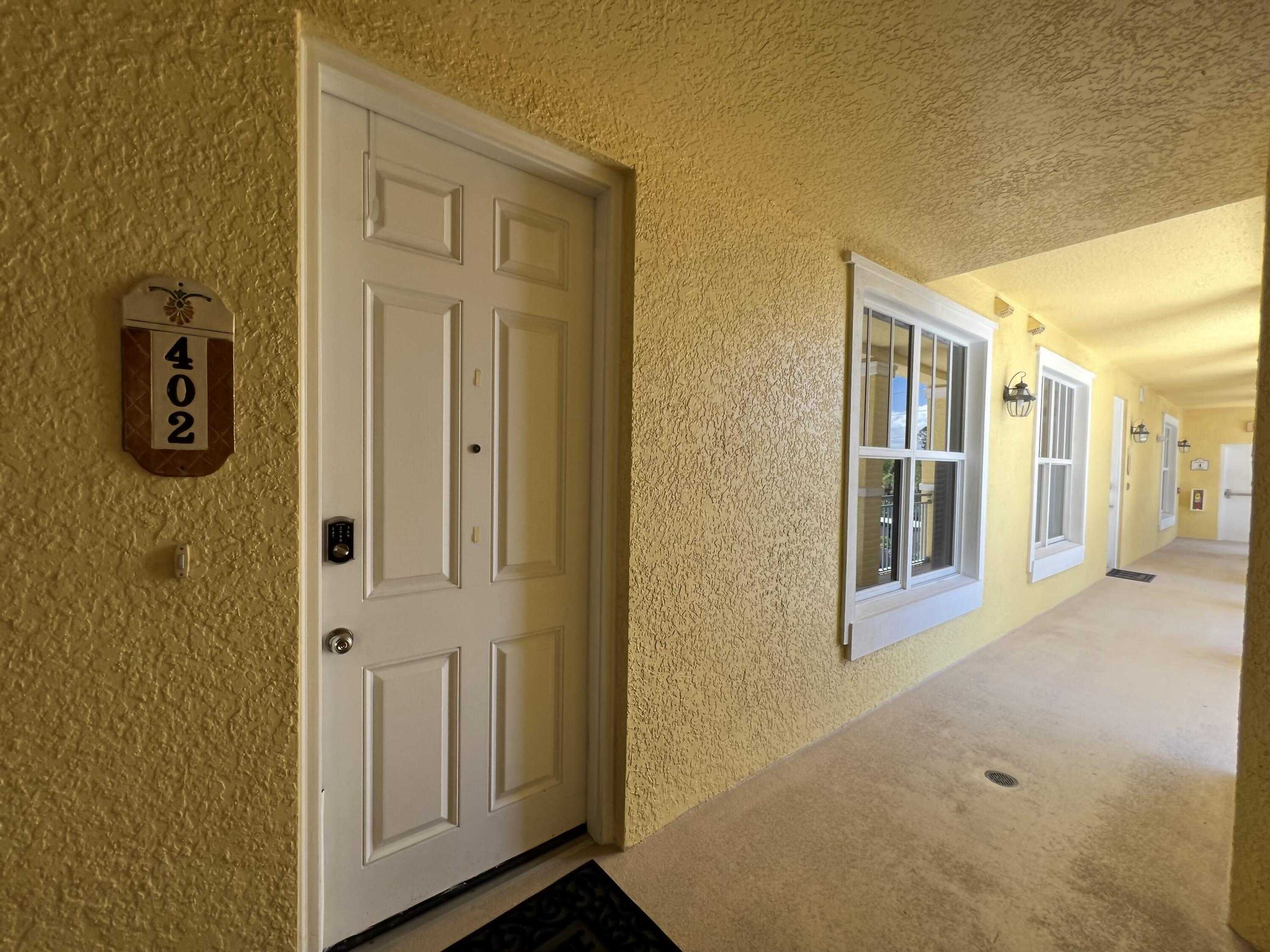 photo 2: 1437 Pineapple Avenue Unit 402, Melbourne FL 32935