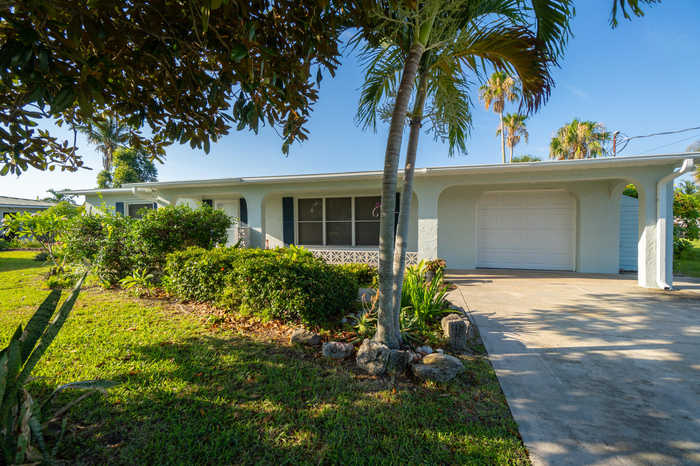 photo 1: 1671 Wavecrest Street, Merritt Island FL 32952