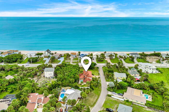 photo 1: 6870 S Highway A1a, Melbourne Beach FL 32951