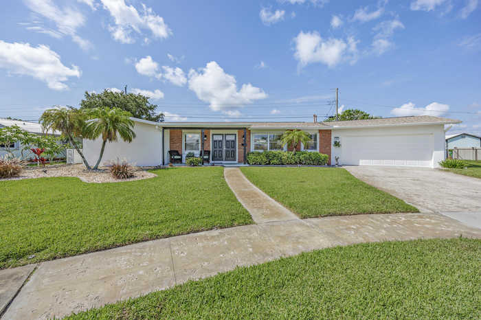 photo 1: 1305 Holiday Boulevard, Merritt Island FL 32952