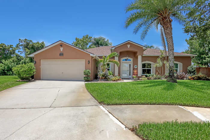 photo 1: 5142 Cocoplum Avenue, Melbourne FL 32940