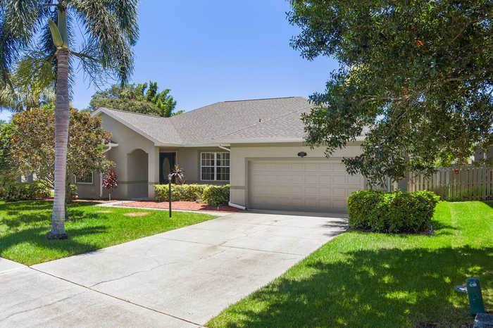 photo 1: 2493 Woodfield Circle, Melbourne FL 32904