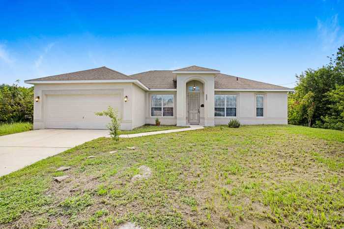 photo 1: 3239 Lakeland Avenue, Palm Bay FL 32908