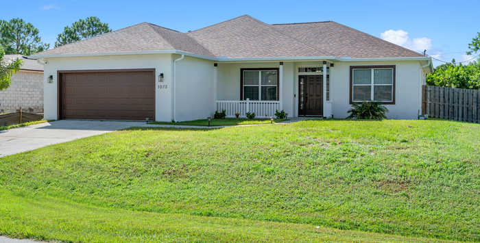 photo 1: 1073 Welco Street SE, Palm Bay FL 32909