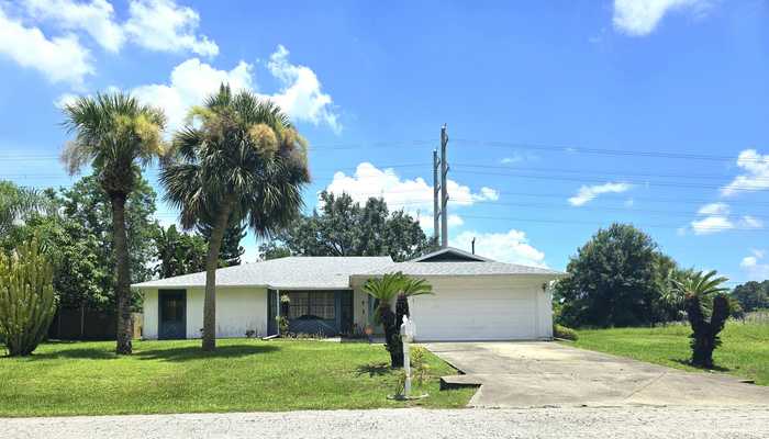 photo 1: 1431 Glencove Avenue NW, Palm Bay FL 32907