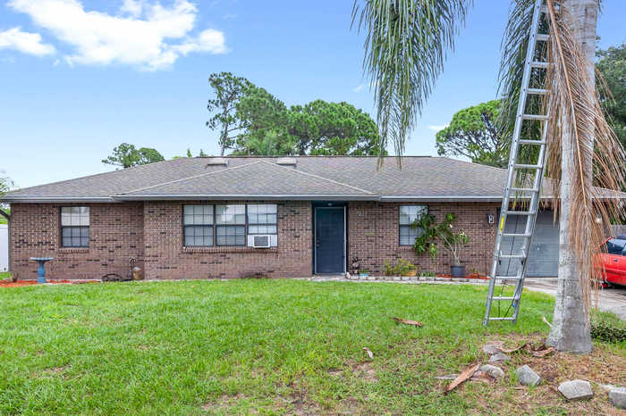 photo 1: 7225 Pluto Avenue, Cocoa FL 32927