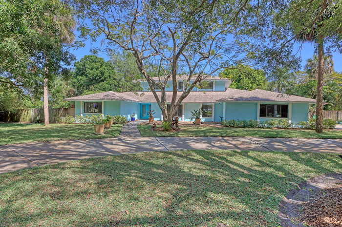 photo 1: 705 River Oaks Lane, Merritt Island FL 32953