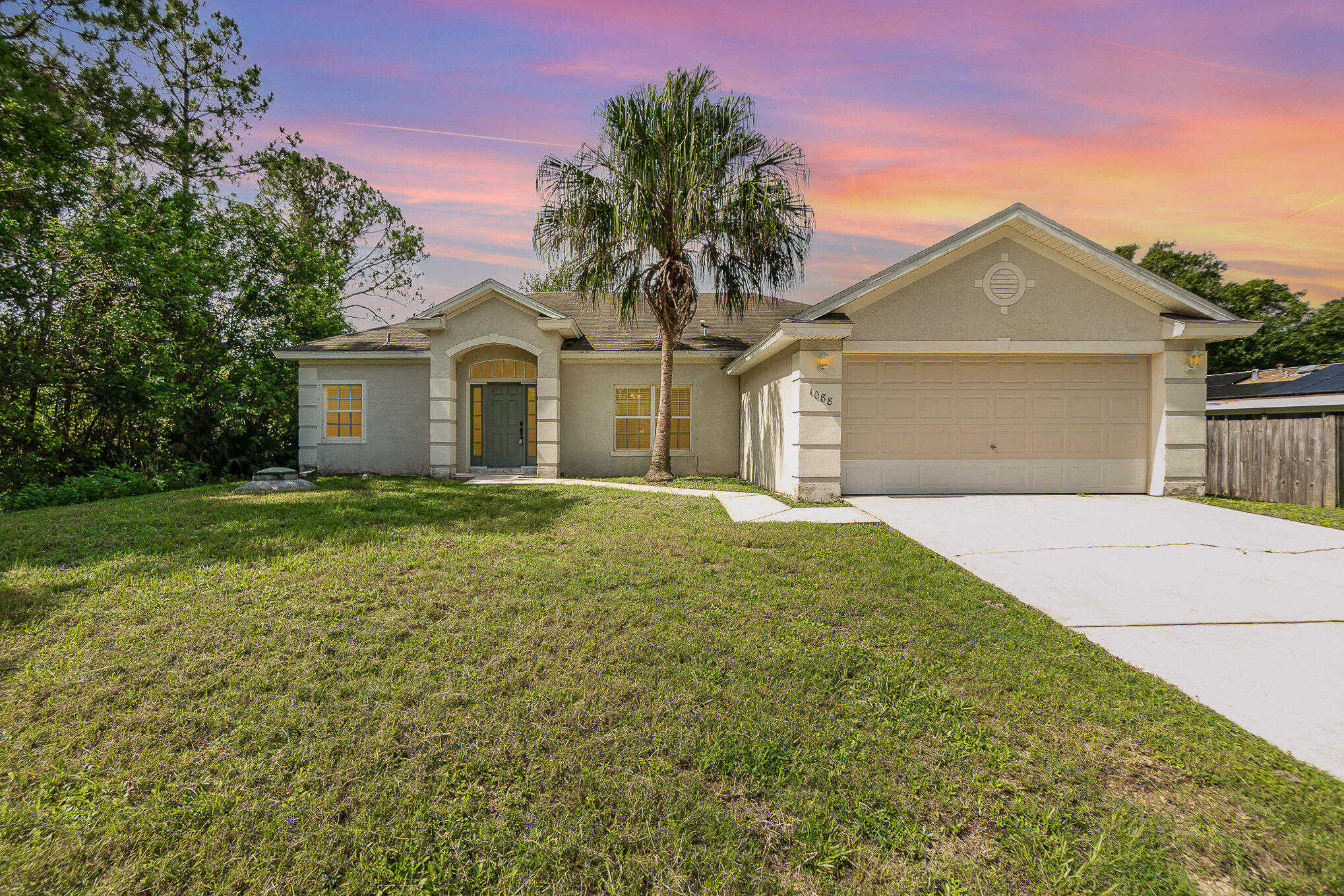 photo 1: 1088 Tupelo Road SW, Palm Bay FL 32908