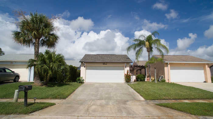 photo 1: 3048 Blackbird Court, Melbourne FL 32935