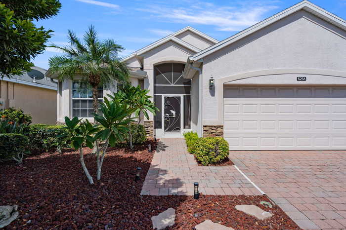 photo 1: 6254 Trieda Drive, Melbourne FL 32940