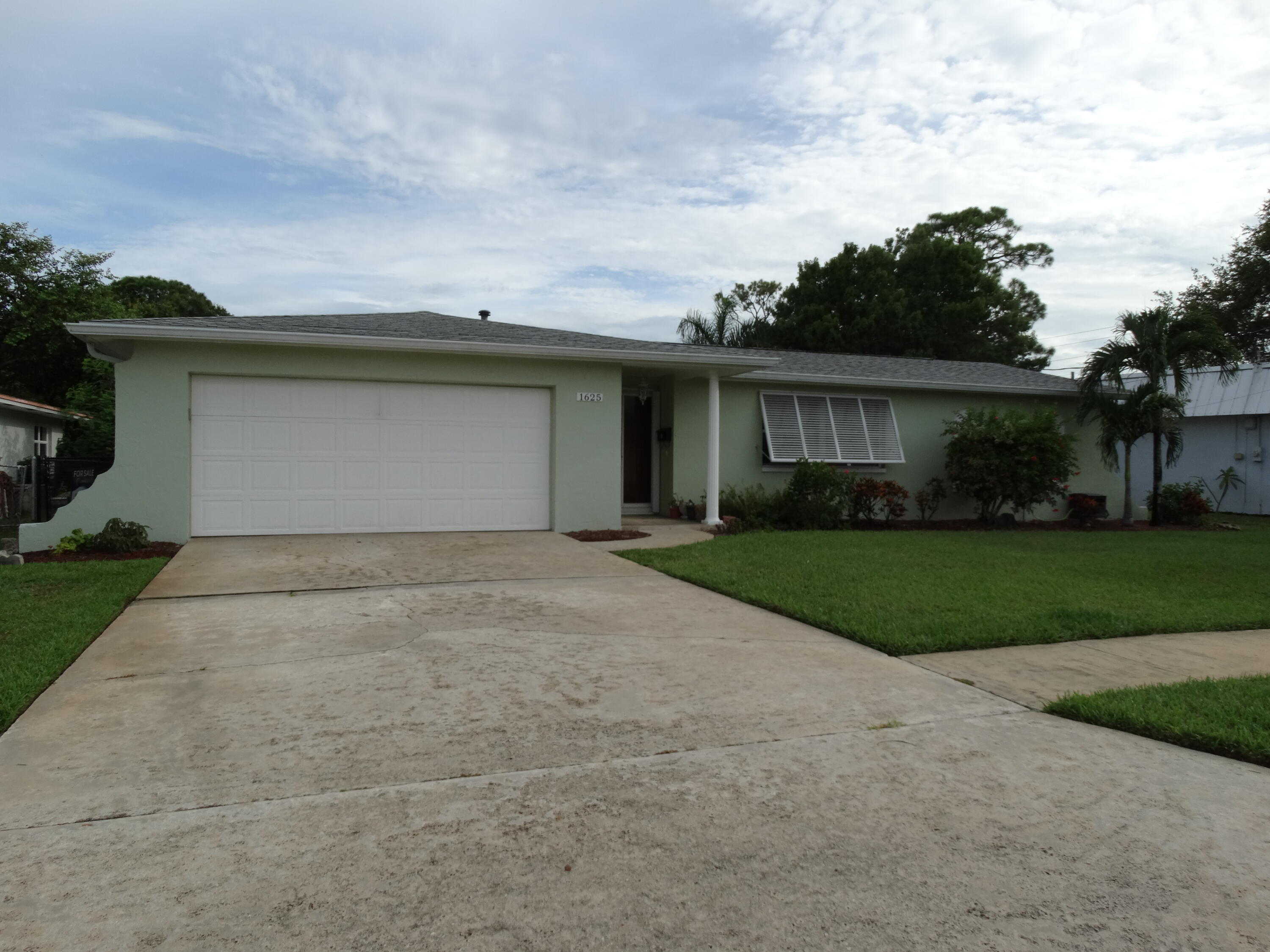 photo 1: 1625 Pelican Drive, Merritt Island FL 32952