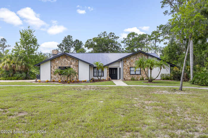 photo 1: 1209 Sand Pine Circle, Titusville FL 32796