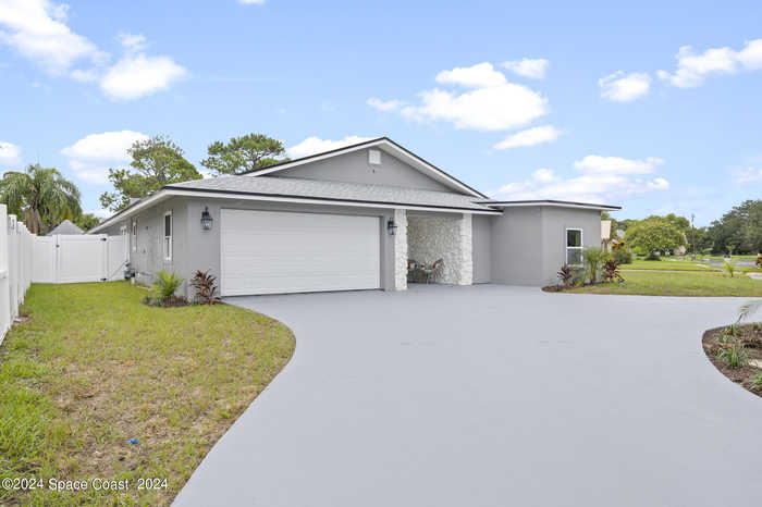 photo 1: 3610 Nicklaus Drive, Titusville FL 32780