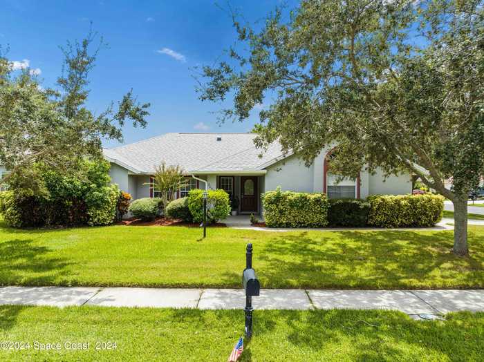 photo 1: 2052 Woodfield Circle, West Melbourne FL 32904