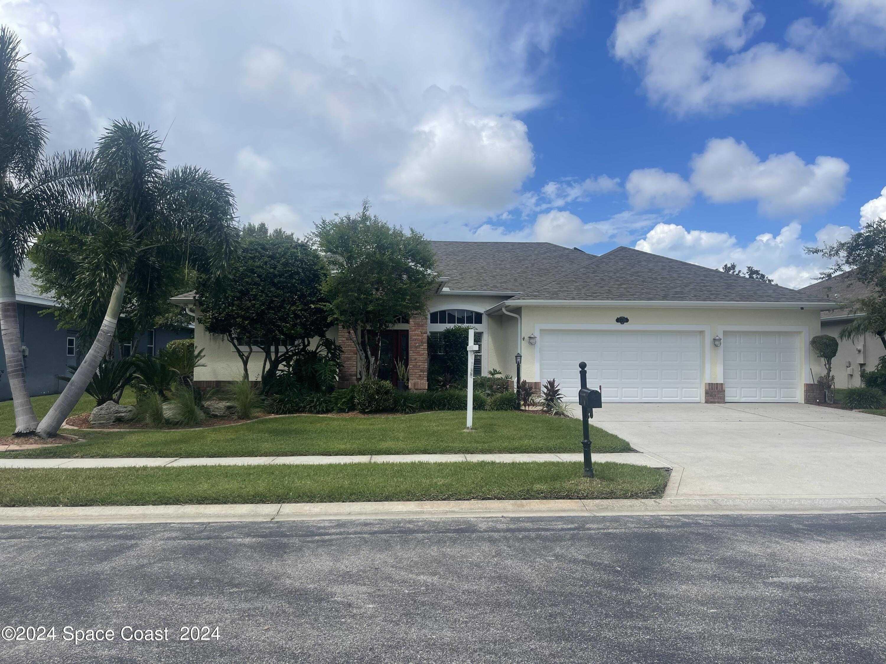 photo 1: 2410 Windchaser Court, Melbourne FL 32904